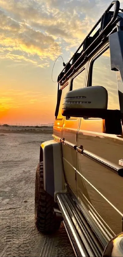 Off-road SUV at sunset on sandy terrain.