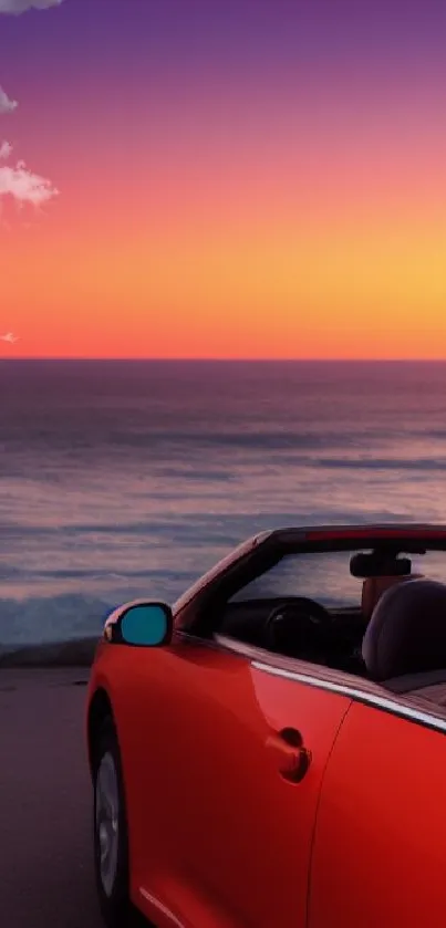 Convertible by the ocean under a vibrant sunset sky.