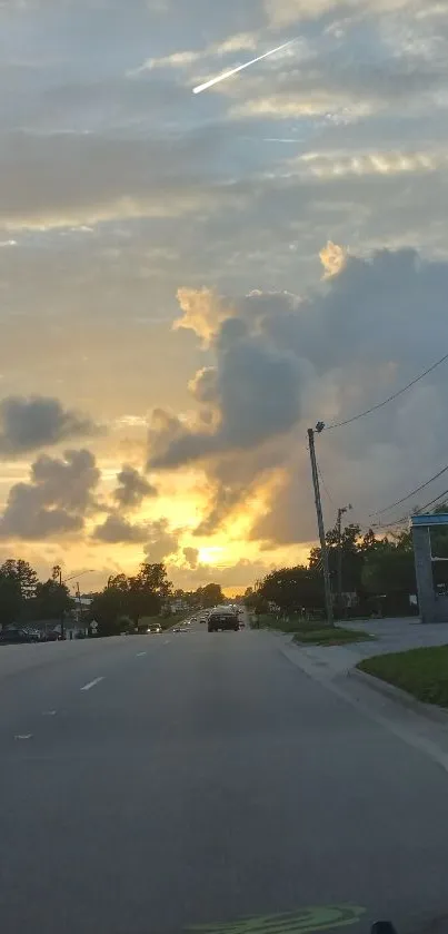 Serene sunset drive with vibrant sky and tranquil road.