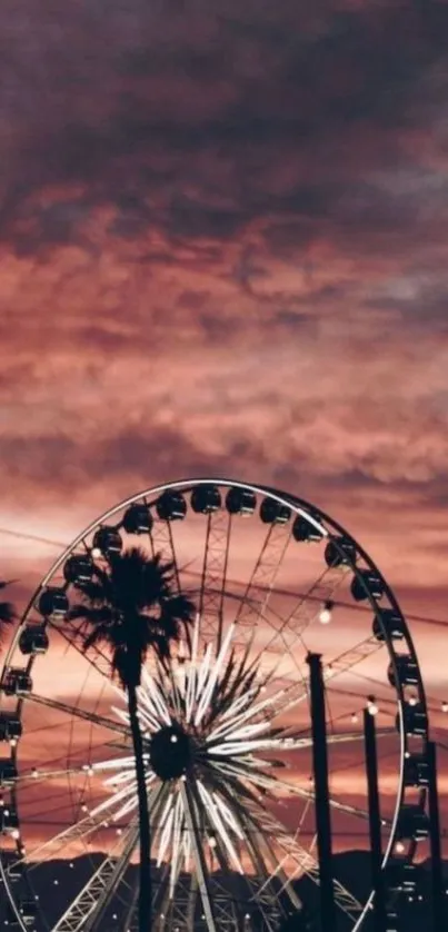 Ferris wheel silhouetted against a dramatic sunset sky with palm trees.