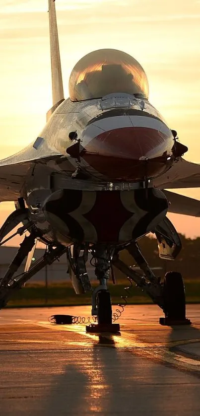 Fighter jet on runway at golden sunset.