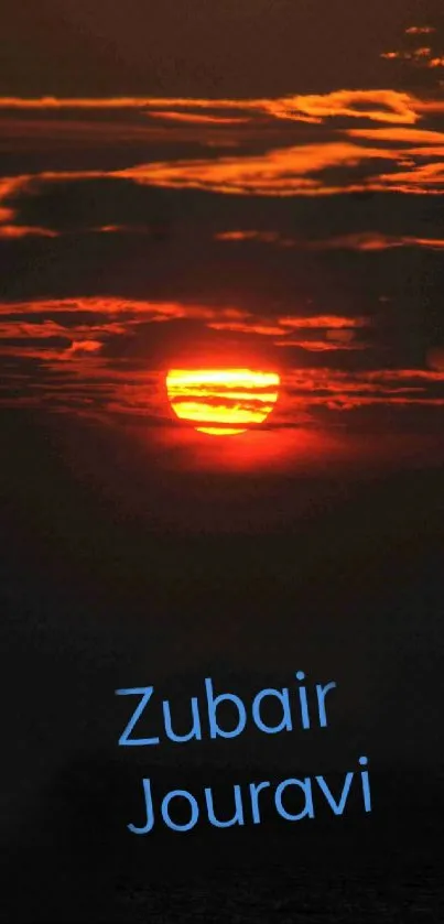 Sunset over horizon with vivid orange hues.