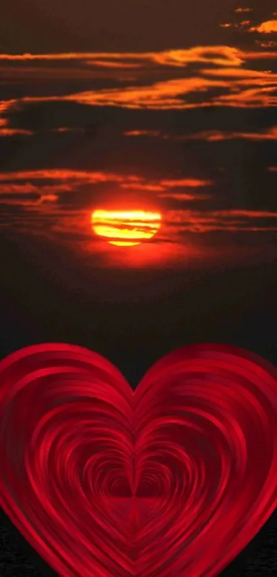 Stunning sunset with a glowing red heart on mobile wallpaper.