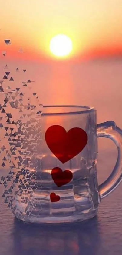 Glass mug with hearts at sunset over a calm sea.