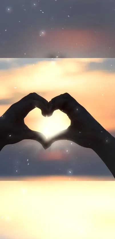 Heart-shaped silhouette hands at sunset with glowing sky and stars.