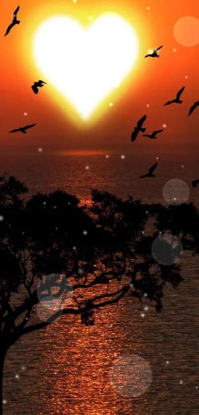 Heart-shaped sun at sunset with birds and tree silhouette.