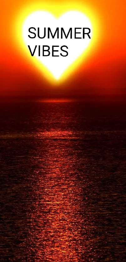 Heart-shaped sunset with 'Summer Vibes' text over ocean.