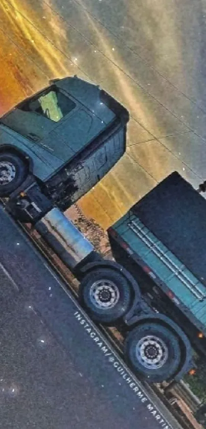 Truck driving on highway during a colorful sunset with a clear sky.