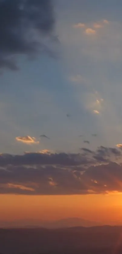 Beautiful sunset horizon with vivid colors and clouds.