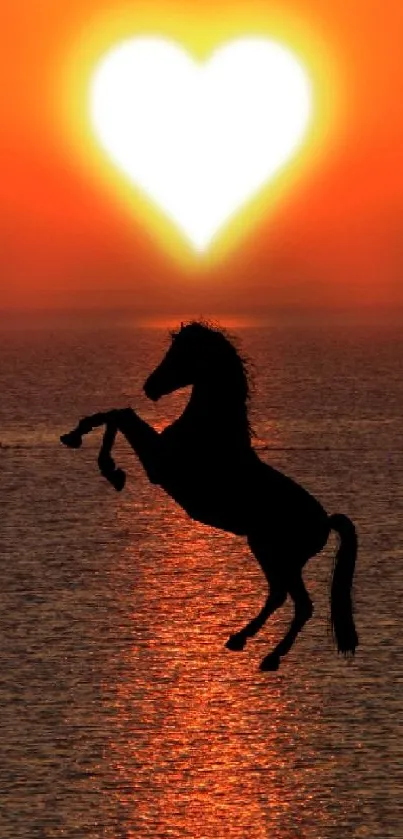 Vibrant sunset with horse silhouette and heart-shaped sun over the sea.