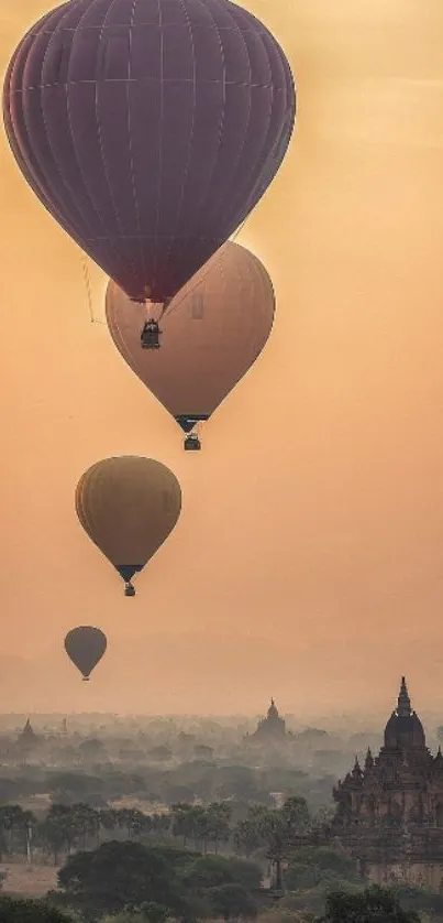 Hot air balloons float at sunset over ancient temples.