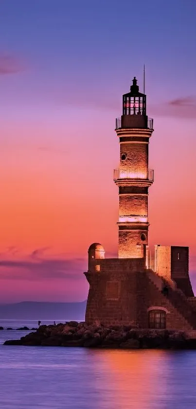 Lighthouse against a vibrant purple sunset background over the ocean.