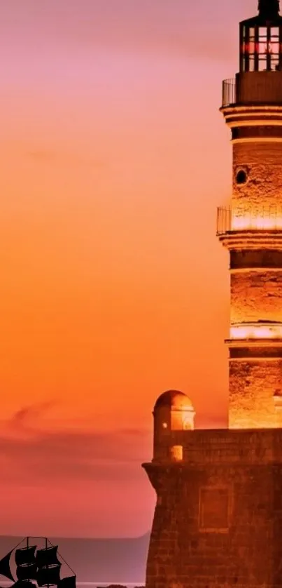 A silhouette of a lighthouse at sunset with a vivid orange sky.