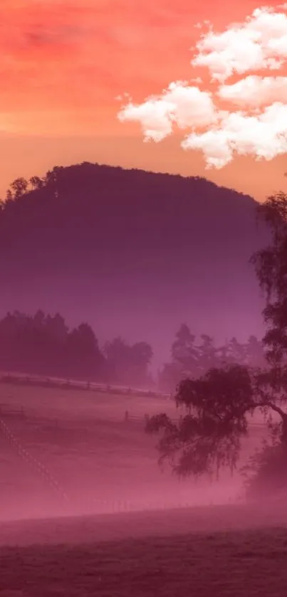 Misty sunset view with vibrant colors over rolling hills.