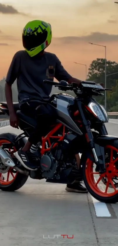 Motorcycle rider against a sunset background on a street.