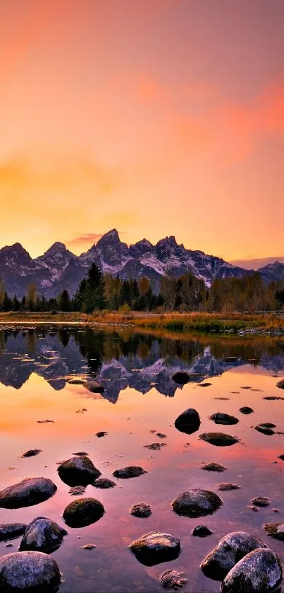 Sunset mountain reflection on a serene lake with vivid colors.