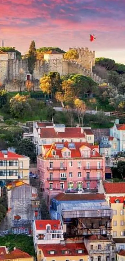 Lisbon cityscape at sunset with vibrant sky and historic rooftops.