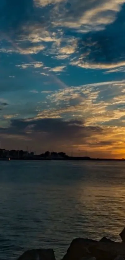 Beautiful sunset over the ocean with a dramatic sky.