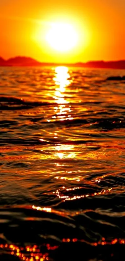 Sunset reflecting over ocean waves at dusk.