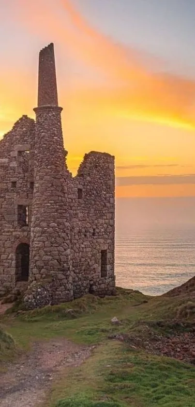 Stone tower at sunset by the ocean.