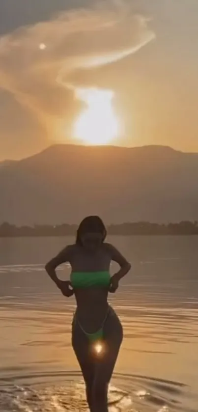 A tranquil sunset over calm waters with a silhouetted figure and clouds in the sky.