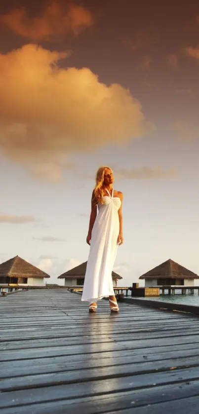 Stunning sunset overwater bungalows with dramatic evening sky and calm ocean view.