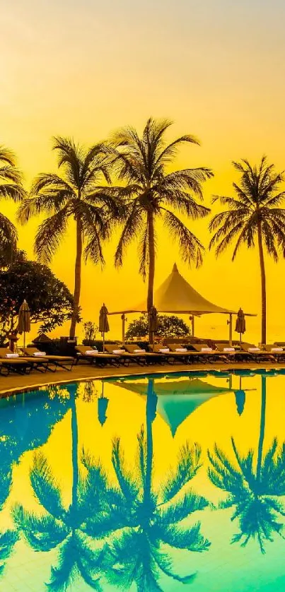 Vibrant sunset with palm trees reflecting on a serene pool.