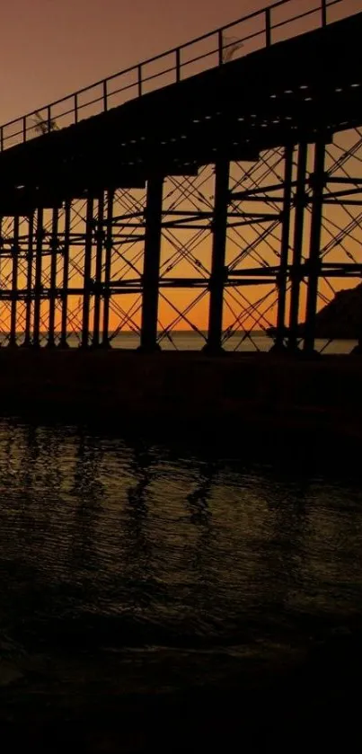 Mobile wallpaper of a pier silhouetted against a colorful sunset.