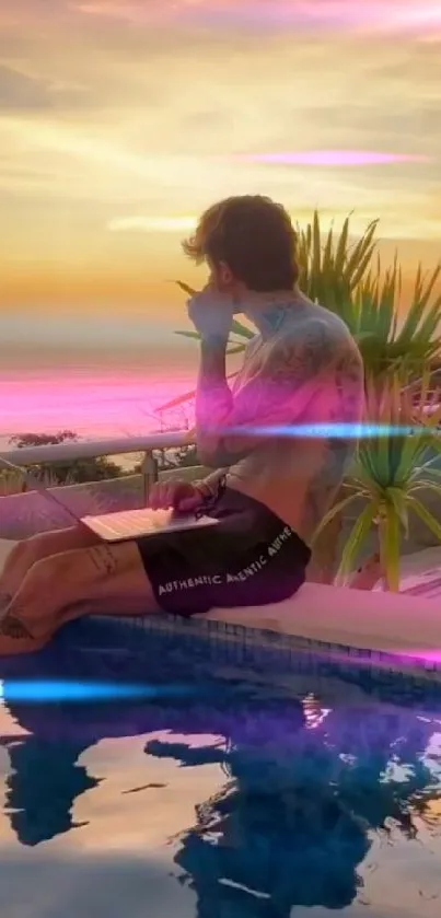 Man with tattoos sitting by the pool, gazing at a stunning sunset over the ocean.