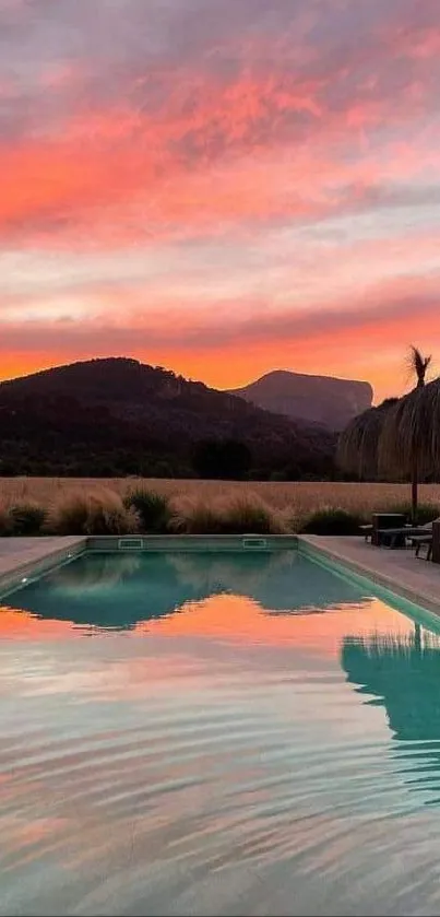 A tranquil sunset view over a pool reflecting vibrant orange hues.