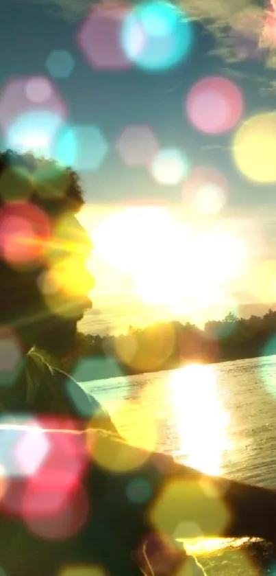 Silhouetted figures by a riverside during a vibrant sunset.