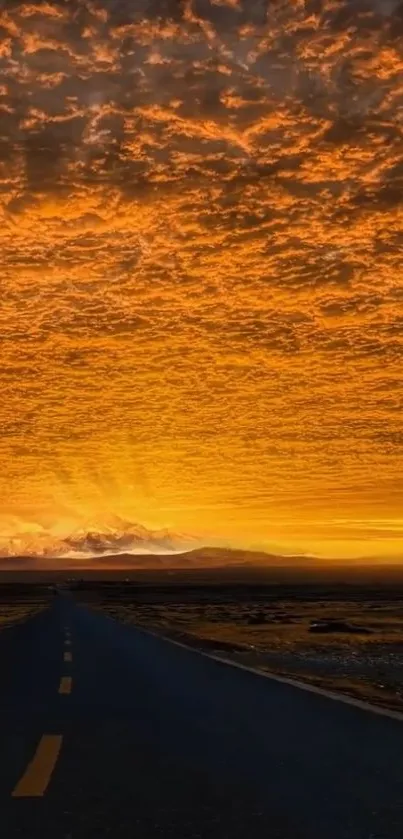 Vibrant sunset road with a golden sky.