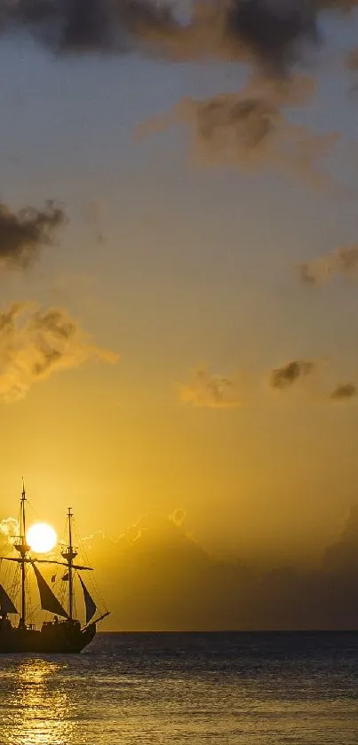 Silhouetted sailing ship at sunset on calm ocean.