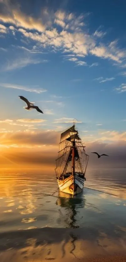 Serene sunset with sailing ship and seagulls over calm ocean waters.