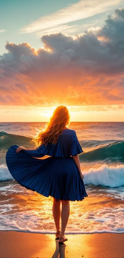 Woman in blue dress at sunset beach with colorful sky and ocean waves.