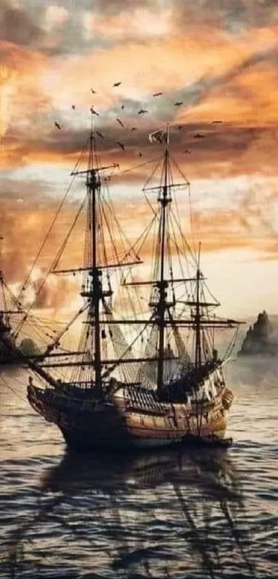 Historic ship sails through a fiery sunset, surrounded by dramatic clouds and ocean waves.