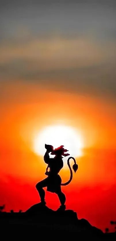 Silhouette of a figure against a vibrant orange sunset background.