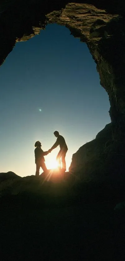 Silhouetted figures during sunset in a cave, capturing natural beauty and contrast.