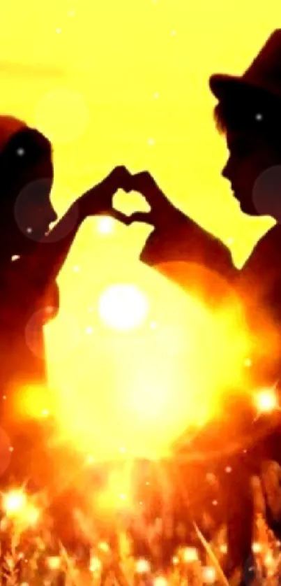 Romantic sunset with children silhouette making a heart shape.