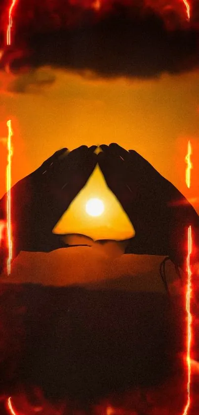 Hands form a triangle around the sun at sunset, creating a peaceful silhouette.