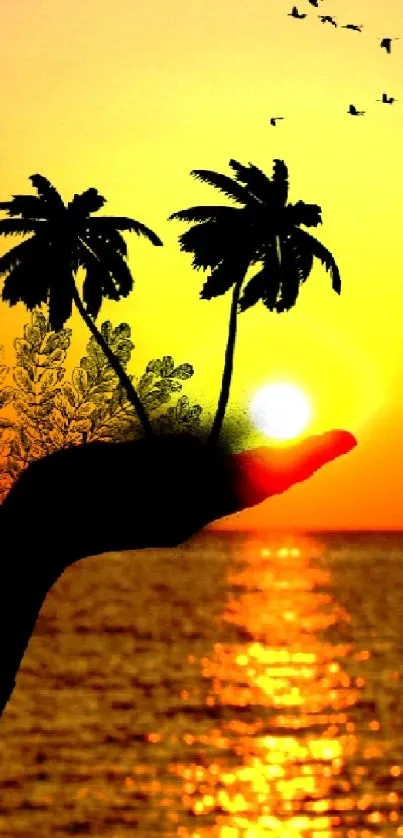 Silhouetted hand with palm trees against a vibrant sunset over the ocean.