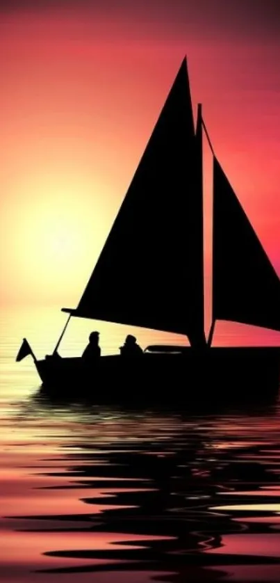 Silhouette sailboat against pink sunset on ocean.