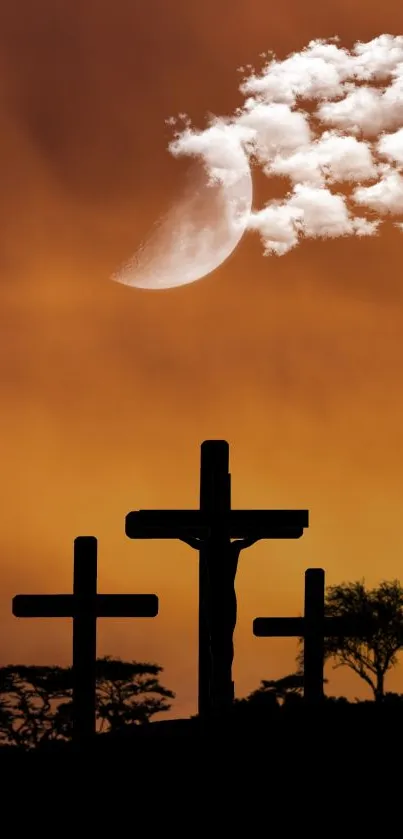 Silhouette of three crosses at sunset with a cloudy moonlit sky.