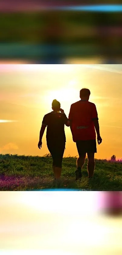 Two people walking at sunset on a grassy hill with vibrant colors.