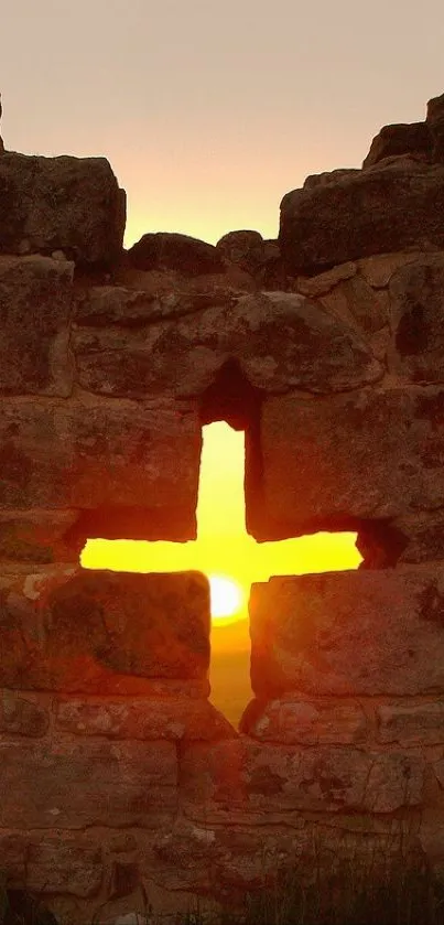 Glowing sunset through an ancient stone wall.