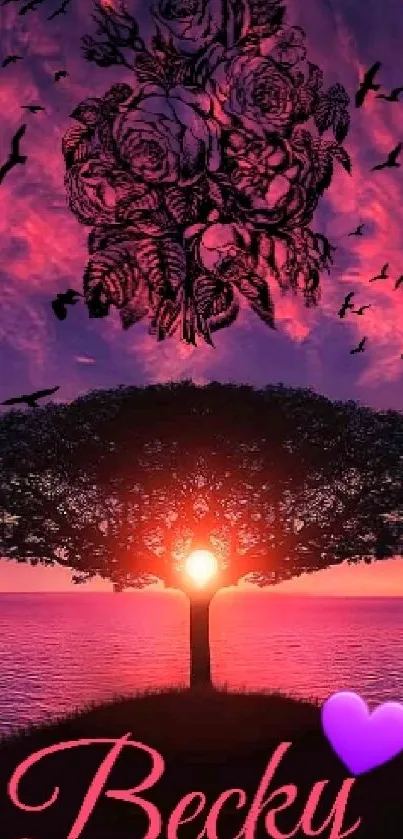 Tree silhouette at sunset with pink and purple sky.