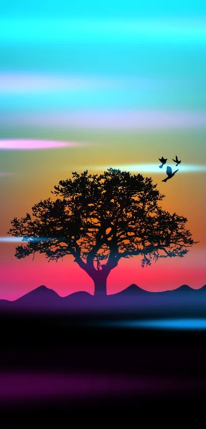 Sunset tree silhouette with birds and colorful gradient sky.