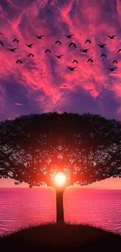 Majestic sunset tree with flying birds over calm waters.