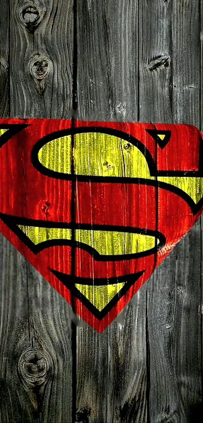 Superman logo on a wood background with red and yellow colors.