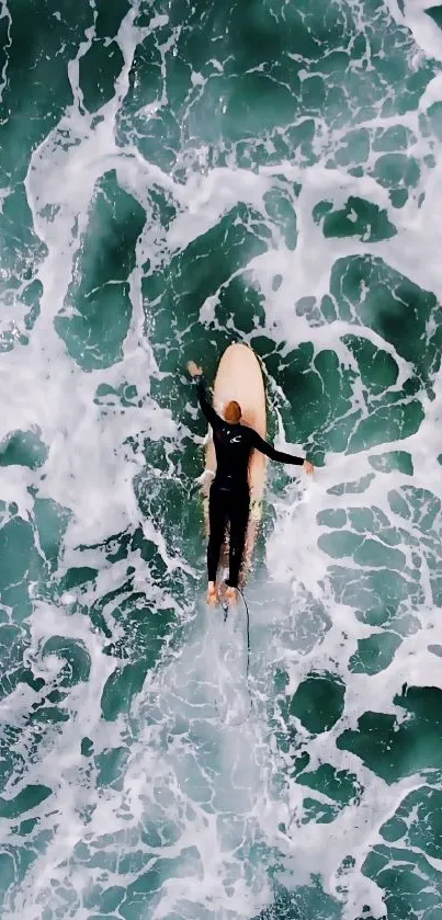 Surfer riding waves in ocean wallpaper